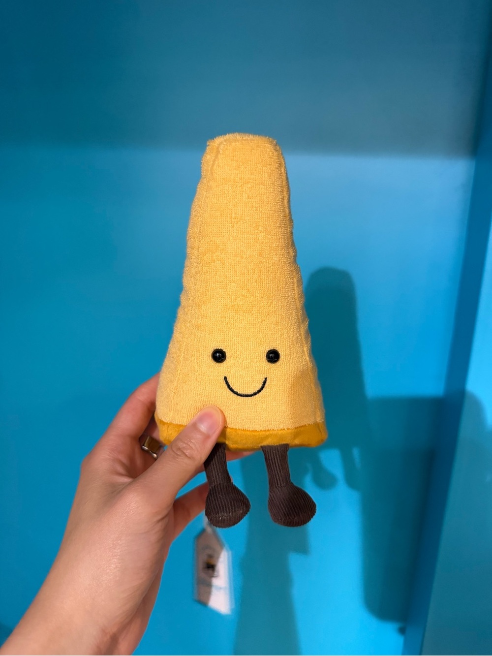 Jellycat Yellow Smiley Cone Plush Toy with Brown Legs cheese